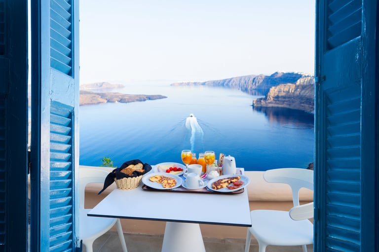 breakfast for two with coffee and fresh juice at morning by seaside