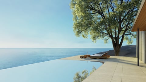 Modern lounge chair on a terrace with ocean view
